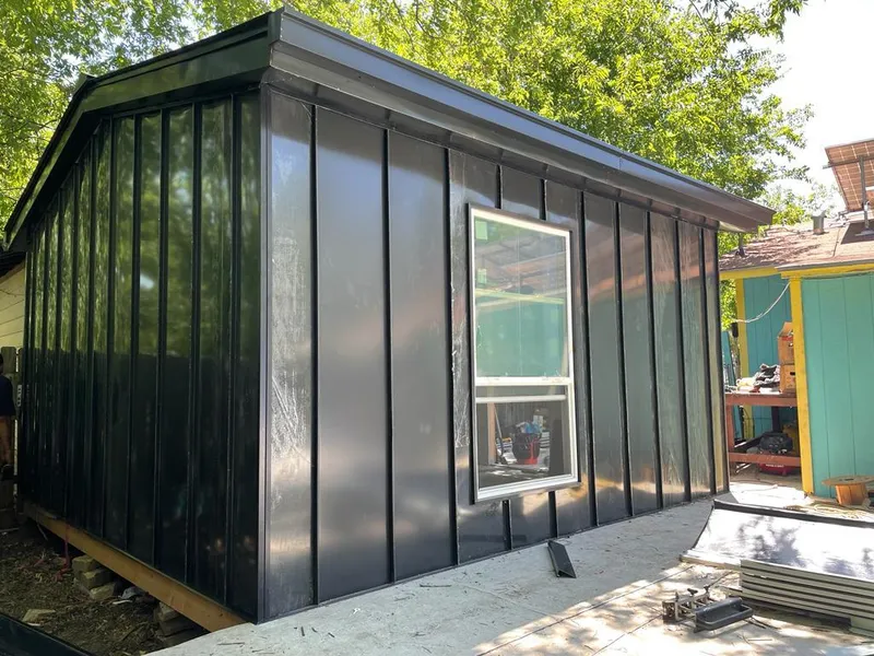 Black standing seam metal wall panels for Metal Roof Installation in Richmond West